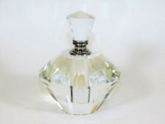 A decorative faceted crystal scent bottle 5in tall