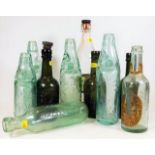 Ten vintage bottles including a Liskeard label Gui