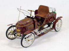 A tinplate Stanley Steamer model car