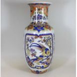 A large French faience vase with bird & floral dec