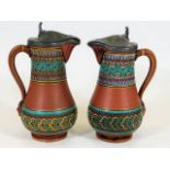 A pair of Prattware terracotta jugs with pewter li