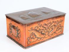 A Newlyn arts & crafts copper box with nautical & aquatic related decor, stamped Newlyn to underside