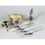 A silver sugar bowl, pepper pot & salt twinned wit