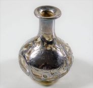 A silver cased glass scent bottle, lacking stopper