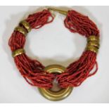 An African style multi strand coral necklace with