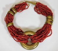 An African style multi strand coral necklace with