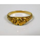 A high carat gold yellow metal ring 3.7g inscribed