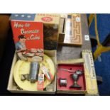A selection of vintage cake making equipment & sun