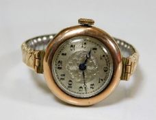 A ladies 9ct gold cased watch