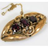 A 19thC. yellow metal brooch set with amethyst, pi