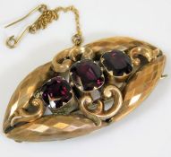 A 19thC. yellow metal brooch set with amethyst, pi