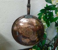 A 19thC. copper warming pan