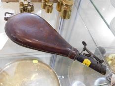 A small WW1 leather shot pouch twinned with a 1930's brass oil can