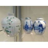 A 19thC. Chinese porcelain pot & cover, decor worn with two small chips to top of lid, twinned with