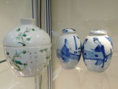 A 19thC. Chinese porcelain pot & cover, decor worn with two small chips to top of lid, twinned with