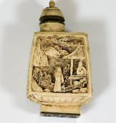 A carved Chinese resin snuff bottle