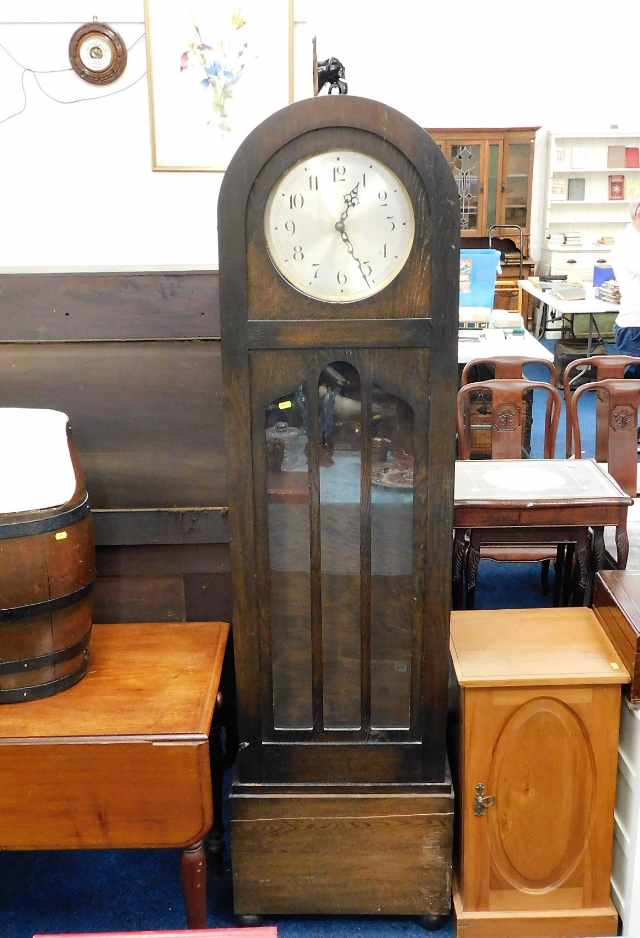 A large 1920's floor standing longcase clock