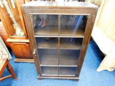 A small glazed bookcase