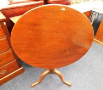 A 19thC. mahogany tilt top table