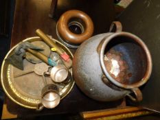 Two copper jelly moulds, a copper plates urn with