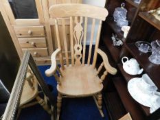 A large beech rocking chair