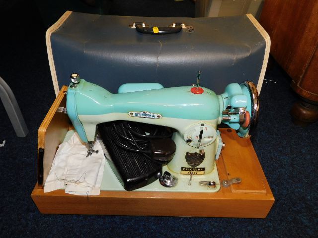 A cased electric sewing machine