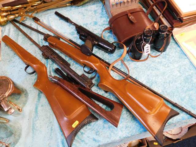 One air rifle twinned with an air pistol & one oth