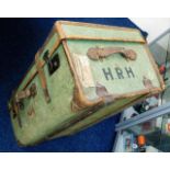 A vintage travel trunk sporting initials HRH