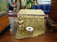 A novelty brass stationary stand with inkwell