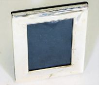 A boxed small silver photo frame 4.75in x 3.75in