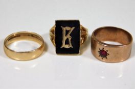 Two 9ct gold rings, one set with onyx, twinned with one 15ct ring 13.6g