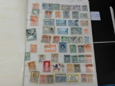 Two albums of world stamps including South America