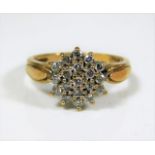 A 9ct gold diamond cluster ring 3.4g size P/Q