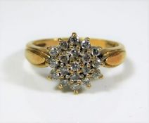 A 9ct gold diamond cluster ring 3.4g size P/Q