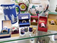 A Wedgwood jug, a guilloche thimble twinned & thre