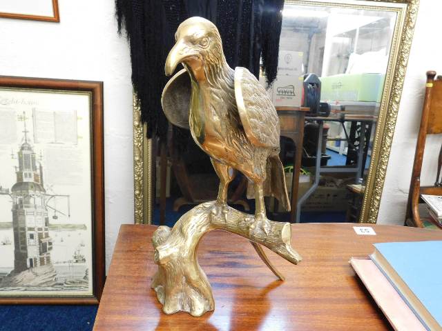 A large brass bird of prey model