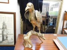 A large brass bird of prey model