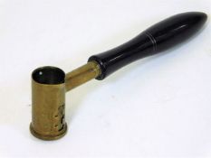 A 19thC. brass powder measure