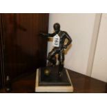 A bronze 1930's footballer on plinth