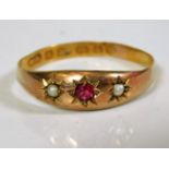 An antique 22ct gold ring set with natural pearl &