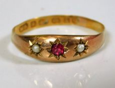 An antique 22ct gold ring set with natural pearl &