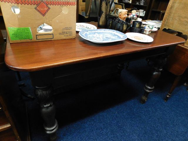 A 19thC. mahogany table with turned & carved legs