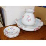 A floral wash basin set