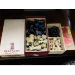 Two Staunton chess sets, boxed