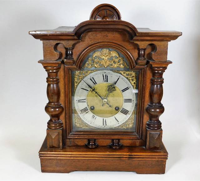 A c.1900 mantle clock with brass & silvered dial
