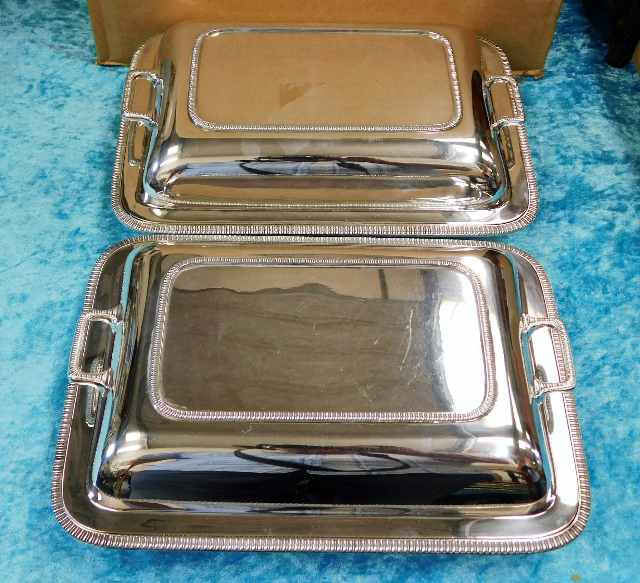 A pair of silver plated entree dishes