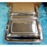 A pair of silver plated entree dishes