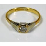 An art deco style 9ct gold ring with white metal m