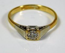 An art deco style 9ct gold ring with white metal m