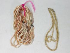 Twelve cultured pearl necklaces twinned with two p